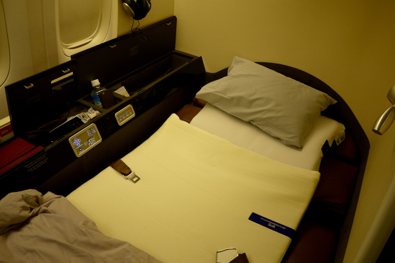 First Class Bed - Japan Airlines JL771 NRT-SYD First Class Review | Point Hacks