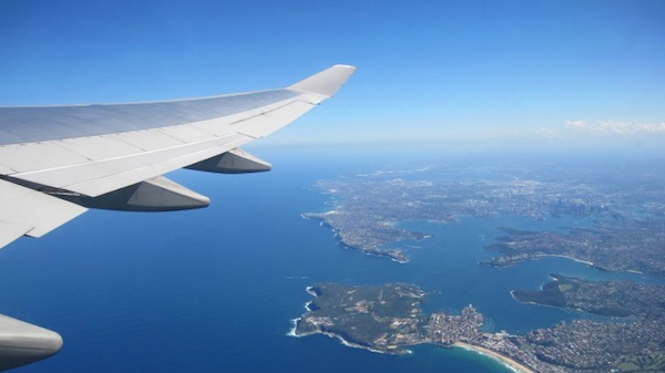 Plane wing over Sydney