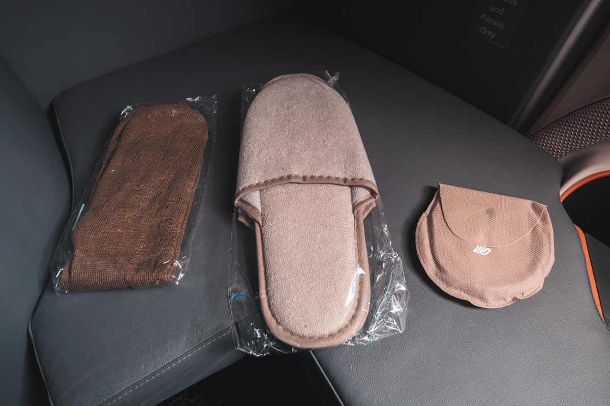 Singapore Airlines slippers, socks and eyemask