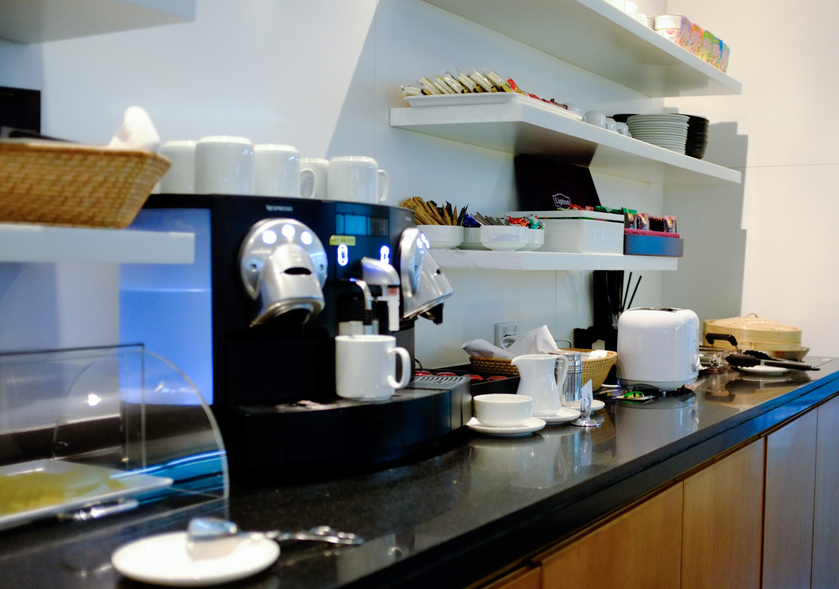 Cathay Pacific Business and First Class Melbourne Lounge self-service coffee maching and tea station