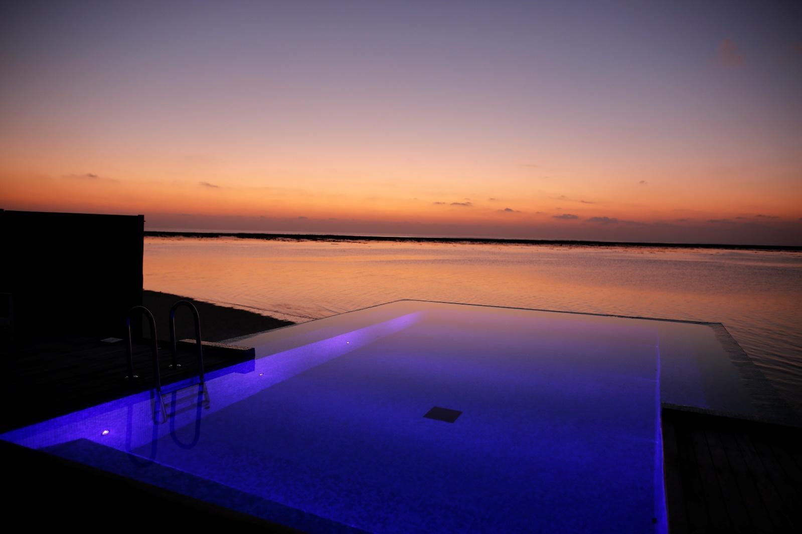 Conrad Rangali Maldives Sunset Water Villa infinity pool sunset view