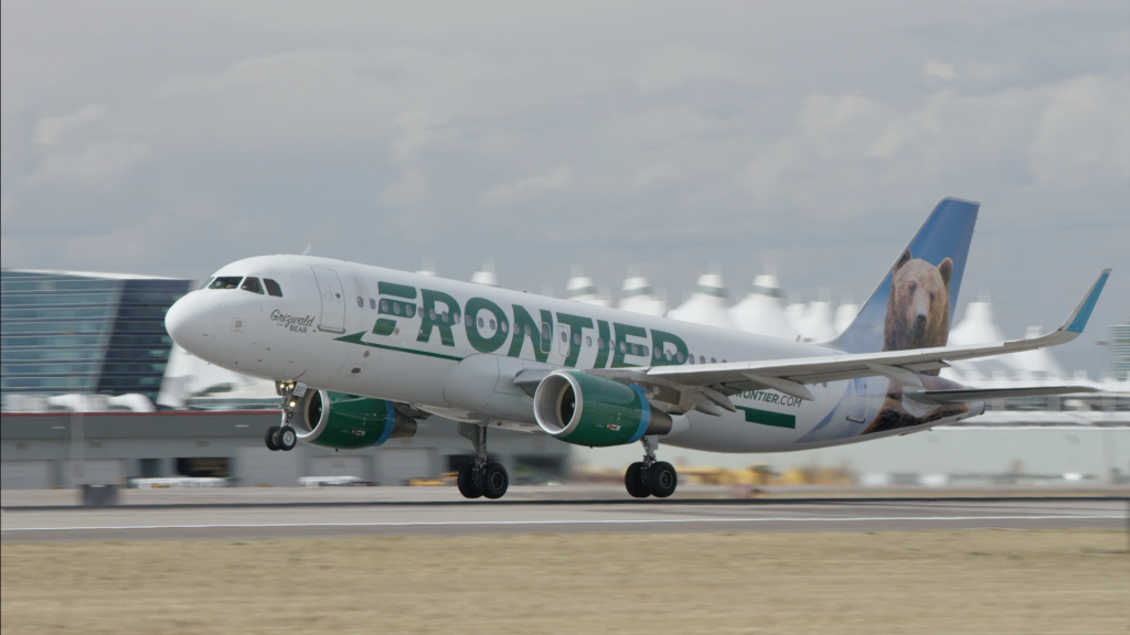 Frontier plane taking off