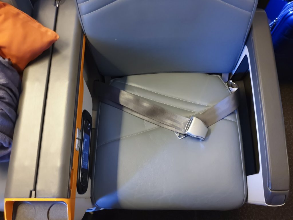 Notice there is a space within the armrest to store a few items.