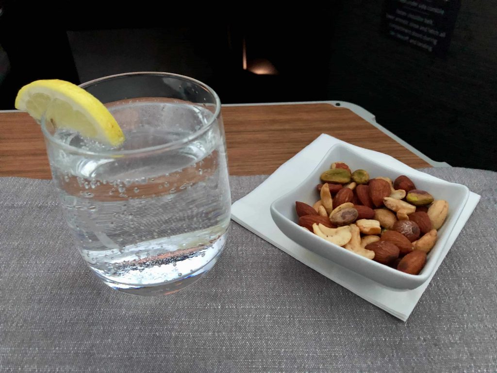 American Airlines 787-9 Business Class welcome drink and nuts